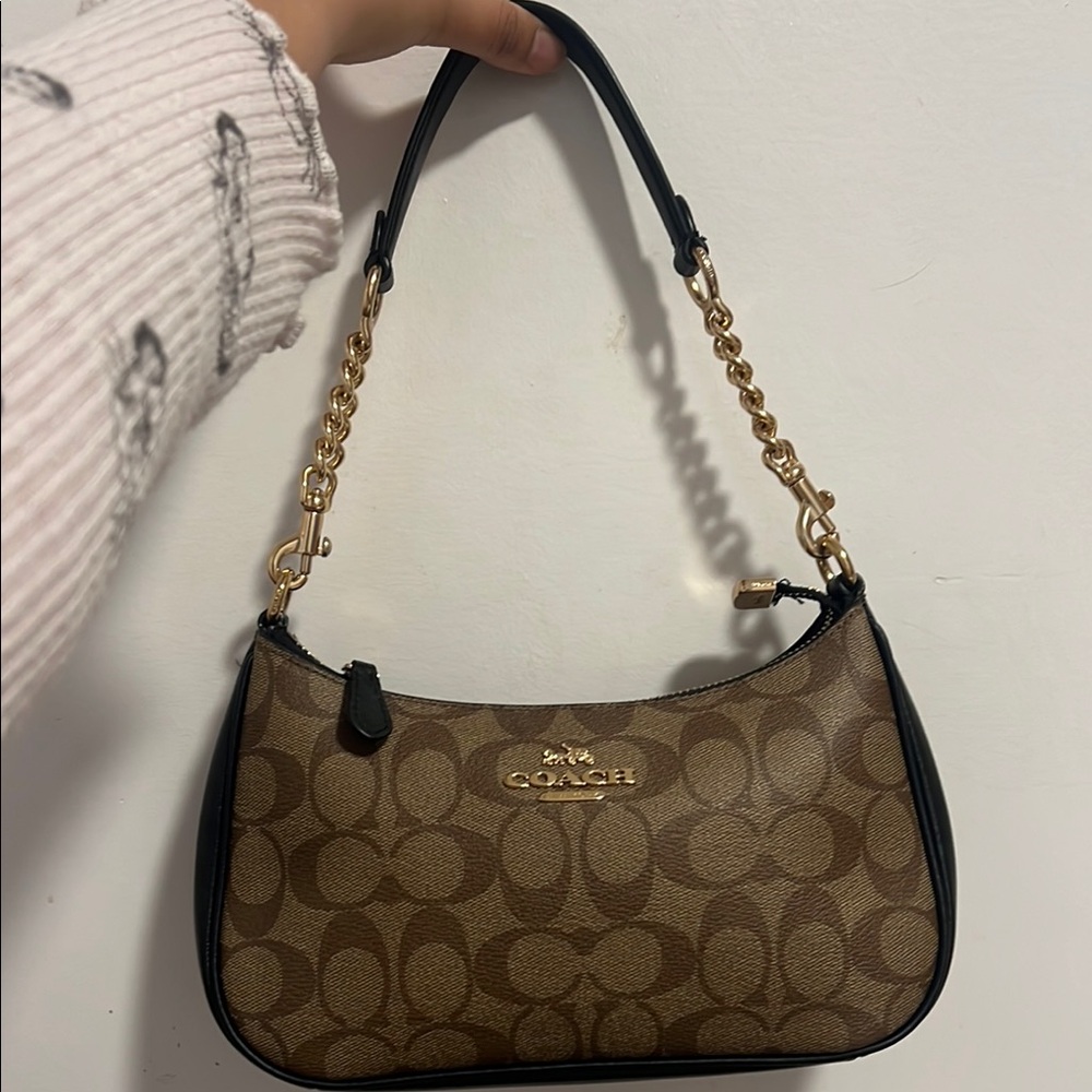 Coach Brown and Black Shoulder Bag Terri w. Extendable strap.